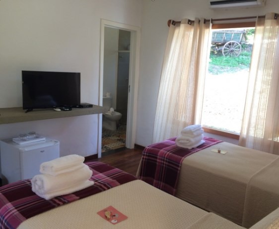 Family suite with private balcony and mountain views