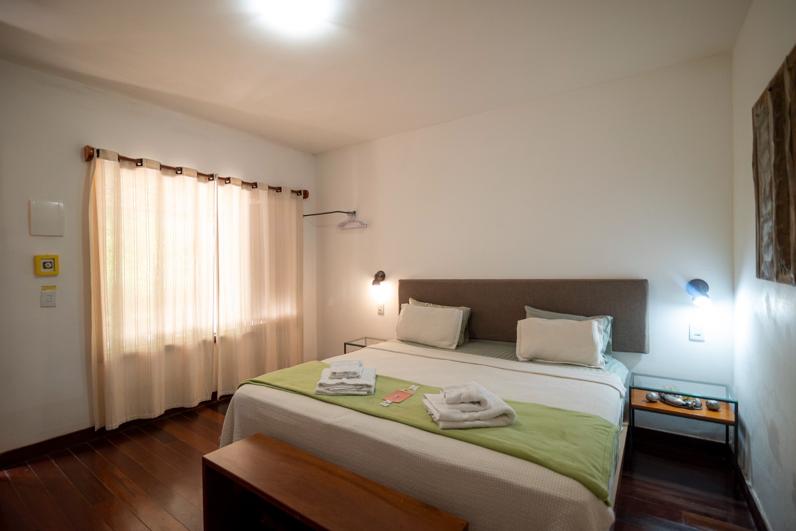 Double suite with king size bed and warm lighting