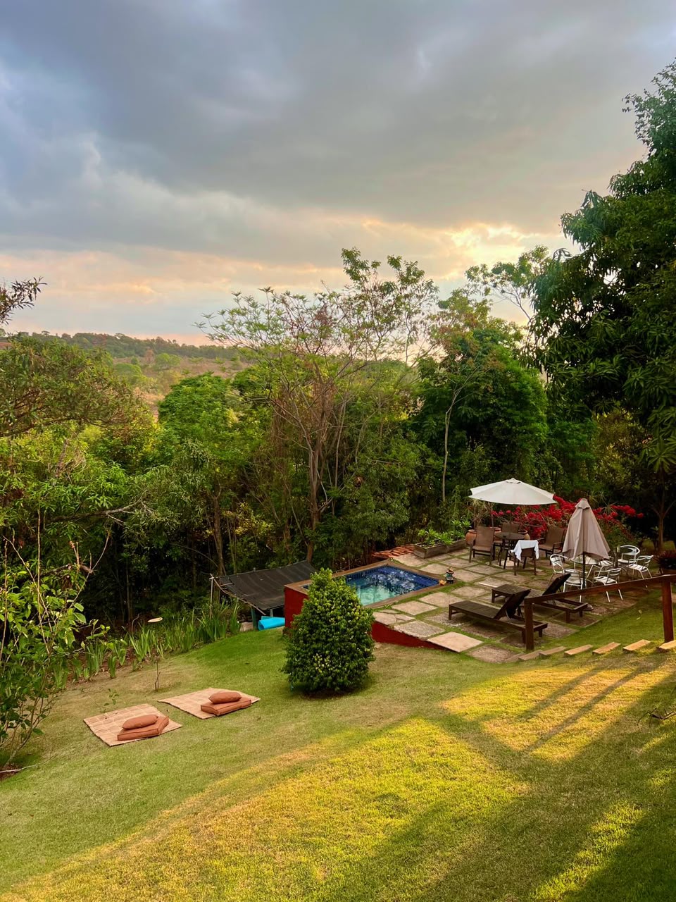 Pool and garden at sunset